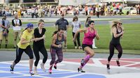 The ladies of NASCAR take to the frontstretch for the 2nd running of the Better Half Dash during Thursday's LiftMaster Pole Night at Charlotte Motor Speedway.