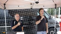 PRN's Doug Rice and KAT Country's Paul Schadt emcee the festivities during the eighth annual Parade of Power at Charlotte Motor Speedway.