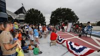 Hundreds of fans gathered for a fan Q&A with NASCAR drivers Bubba Wallace Jr., Clint Bowyer and MXGP rider Phil Nicoletti during the eighth annual Parade of Power at Charlotte Motor Speedway.