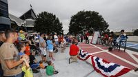 Hundreds of fans gathered for a fan Q&A with NASCAR drivers Bubba Wallace Jr., Clint Bowyer and MXGP rider Phil Nicoletti during the eighth annual Parade of Power at Charlotte Motor Speedway.