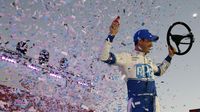 Joey Logano celebrates an XFINITY Series win during a rare Sunday Bank of America 500/Drive for the Cure 300 doubleheader at Charlotte Motor Speedway.