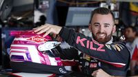 Austin Dillon was all smile in the garage before Sprint Cup Series practice during Thursday's Bojangles' Pole Night at Charlotte Motor Speedway.