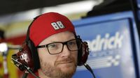 Though unable to drive, Dale Earnhardt Jr. kept an eye on the competition during Thursday's Bojangles' Pole Night at Charlotte Motor Speedway.