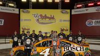 Pole Winner Kevin Harvick poses for a photo in Victory Lane during Thursday's Bojangles' Pole Night at Charlotte Motor Speedway.