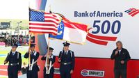 The color guard presents the colors during pre-race for a rare Sunday Bank of America 500/Drive for the Cure 300 doubleheader at Charlotte Motor Speedway.