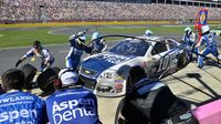 Danica Patrick's crew executes a pit stop during a rare Sunday Bank of America 500/Drive for the Cure 300 doubleheader at Charlotte Motor Speedway.