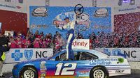 Joey Logano celebrates an XFINITY Series win during a rare Sunday Bank of America 500/Drive for the Cure 300 doubleheader at Charlotte Motor Speedway.