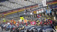 Trucks pull onto pit road following a caution during an action-packed NASCAR Sprint All-Star Race day at Charlotte Motor Speedway.