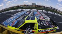 Matt Crafton grabs the checkered flag and the North Carolina Education Lottery 200 during an action-packed NASCAR Sprint All-Star Race day at Charlotte Motor Speedway.
