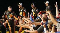 Tony Stewart greets fans at driver introductions during an action-packed NASCAR Sprint All-Star Race at Charlotte Motor Speedway.