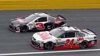 Chase Elliott and Austin Dillon race side-by-side in the Sprint Showdown during an action-packed NASCAR Sprint All-Star Race at Charlotte Motor Speedway.
