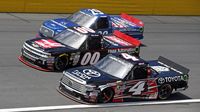 Drivers go three-wide in the North Carolina Education Lottery 200 during an action-packed NASCAR Sprint All-Star Race day at Charlotte Motor Speedway.