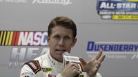 Carl Edwards talks with media about the upcoming NASCAR Sprint All-Star Race during a rain-shortened Friday at Charlotte Motor Speedway.