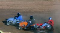 Lawnmower racers clash during the Circle K Back-to-School Monster Truck Bash at The Dirt Track at Charlotte.