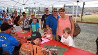 Fans lined up early for autographs from drivers taking part in the Circle K Back-to-School Monster Truck Bash at The Dirt Track at Charlotte.