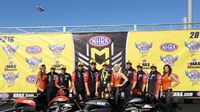 Andrew Hines poses in Winner's Circle after taking home his third consecutive 4-Wide Wally during elimination Sunday at the NHRA 4-Wide Nationals presented by Lowes Foods.