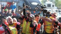 Tim Wilkerson's crew celebrates his Funny Car win during elimination Sunday at the NHRA 4-Wide Nationals presented by Lowes Foods.