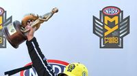 Brittany Force celebrates her second career Top Fuel win during elimination Sunday at the NHRA 4-Wide Nationals presented by Lowes Foods.