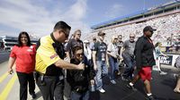 NASCAR driver Rico Abreu joined his ThorSport Racing teammates during the track walk during elimination Sunday at the NHRA 4-Wide Nationals presented by Lowes Foods.