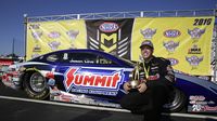 Jason Line celebrates his KB Racing team's win during elimination Sunday at the NHRA 4-Wide Nationals presented by Lowes Foods.