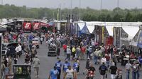 Fans fill the pits during Friday's qualifying action at the NHRA 4-Wide Nationals presented by Lowes Foods.