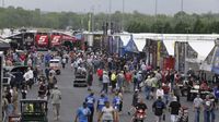 Fans fill the pits during Friday's qualifying action at the NHRA 4-Wide Nationals presented by Lowes Foods.