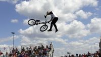 King BMX Stunt Show riders perform during Saturday's qualifying action at the NHRA 4-Wide Nationals presented by Lowes Foods.