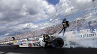 Defending Top Fuel champion Antron Brown performs a burnout during Saturday's qualifying action at the NHRA 4-Wide Nationals presented by Lowes Foods.