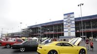 Classic and custom cars on display during Saturday's qualifying action at the NHRA Carolina Nationals at zMAX Dragway.