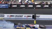 Points leader Ron Capps warms up the tires on his Funny Car during Saturday's qualifying action at the NHRA Carolina Nationals at zMAX Dragway.