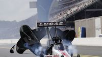 Richie Crampton deploys his parachutes following a qualifying pass during Saturday's qualifying action at the NHRA Carolina Nationals at zMAX Dragway.