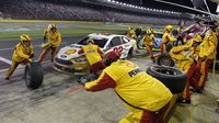 Joey Logano's pit crew goes to work during Sunday's running of the Coca-Cola 600 at Charlotte Motor Speedway.