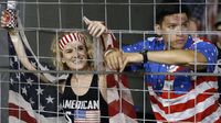 Fans, decked out for Memorial Day Weekend, watch the action during Sunday's running of the Coca-Cola 600 at Charlotte Motor Speedway.