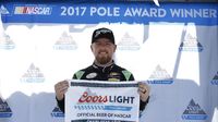 Justin Allgaier celebrates after winning the pole for Saturday's Hisense 4K TV 300 at Charlotte Motor Speedway.