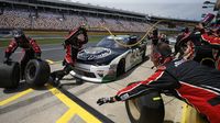 Brandon Jones' crew goes to work during a pit stop at Saturday's Hisense 4K TV 300 at Charlotte Motor Speedway.