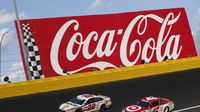Kyle Larson and Joey Logano race for position during Sunday's running of the Coca-Cola 600 at Charlotte Motor Speedway.