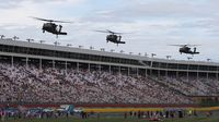 Military helicopters fly low over the speedway as part of a spectacular military pre-race display during Sunday's running of the Coca-Cola 600 at Charlotte Motor Speedway.