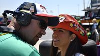 Fans yell over the noise in the garage during Saturday's Hisense 4K TV 300 at Charlotte Motor Speedway.