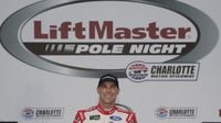 Pole-sitter Kevin Harvick poses for a photo in Victory Lane during Thursday's LiftMaster Pole Night at Charlotte Motor Speedway. 