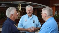 NASCAR Hall of Famer Bobby Allison swaps stories with veteran fans during Charlotte Motor Speedway's longtime fan breakfast honoring 50+-year guests to the speedway.