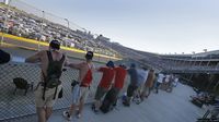 Fans take in the on-track action from the newly opened Turn 4 Sun Deck during Monster Energy All-Star Saturday at Charlotte Motor Speedway.
