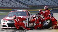Kyle Larson's pit crew goes to work during Friday's no-speed-limit qualifying for the Monster Energy All-Star Race at Charlotte Motor Speedway.