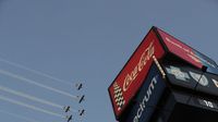 Planes take to the sky for a close-quarters flyover during Monster Energy All-Star Saturday at Charlotte Motor Speedway.