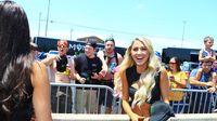 Monster Energy girls greet fans during Friday's action at Charlotte Motor Speedway.