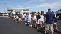 Fans line up to enjoy some of the fun in the Fan Zone during Friday's action at Charlotte Motor Speedway.