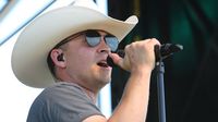 Country star Justin Moore performs during Monster Energy All-Star Saturday at Charlotte Motor Speedway.