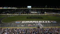 Cars race to the start/finish line during Monster Energy All-Star Saturday at Charlotte Motor Speedway.