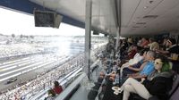 Fans take in the action from the suites during an action-packed Saturday at the NHRA Carolina Nationals.