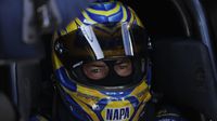 Defending NHRA Funny Car champion Ron Capps waits in his car before a qualifying run during the opening day of the NHRA Carolina Nationals at zMAX Dragway.