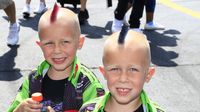 Young fans enjoy the sights and sounds of Nitro Alley during an action-packed Saturday at the NHRA Carolina Nationals.